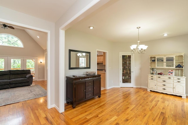 328 Mill Hamlet Rd NW, Charleston, TN 37310 - dining area featuring a chandelier, light wood-type flooring, vaulted ceiling, baseboards, and recessed lighting