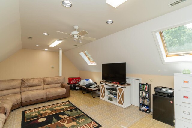 328 Mill Hamlet Rd NW, Charleston, TN 37310 - living room featuring a skylight, vaulted ceiling, light flooring, a ceiling fan, and recessed lighting