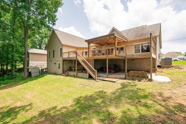 328 Mill Hamlet Rd NW, Charleston, TN 37310 - back of property featuring a deck, a ceiling fan, stairway, a yard, and roof with shingles