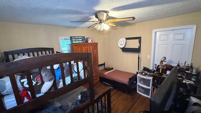 122 Meredith Dr, Turtletown, TN 37391 - bedroom featuring wood finished floors, a textured ceiling, and ceiling fan