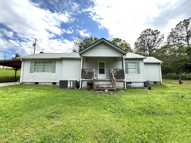 122 Meredith Dr, Turtletown, TN 37391 - back of house featuring crawl space, central air condition unit, covered porch, and metal roof