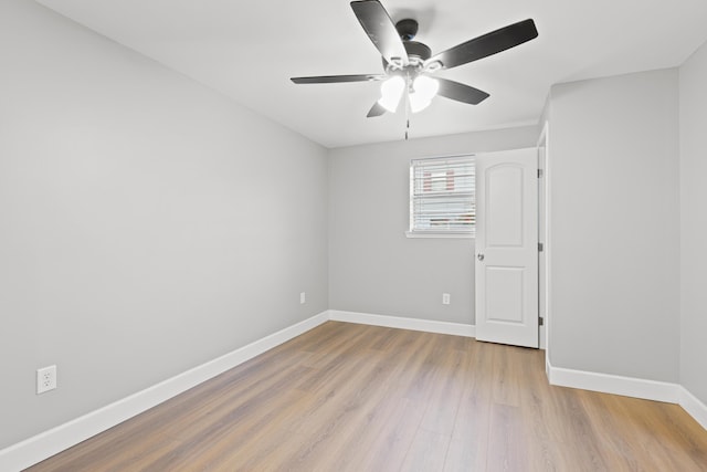 unfurnished room featuring ceiling fan and light hardwood / wood-style floors