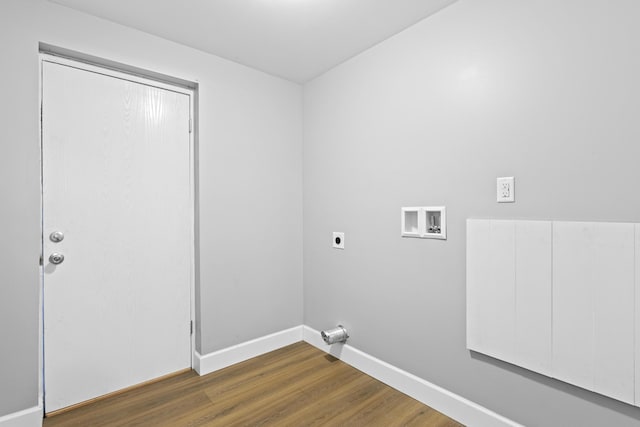 laundry room featuring electric dryer hookup, dark hardwood / wood-style flooring, and hookup for a washing machine