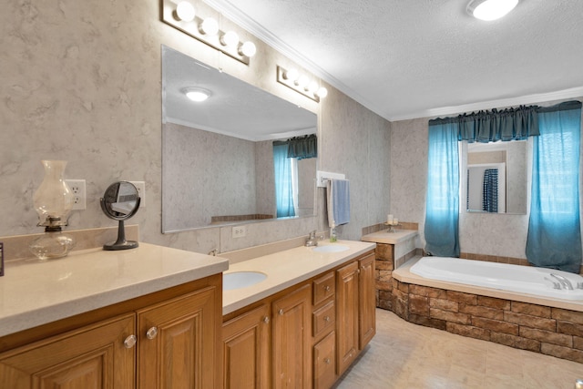 bathroom featuring a textured ceiling, crown molding, wallpapered walls, and a sink