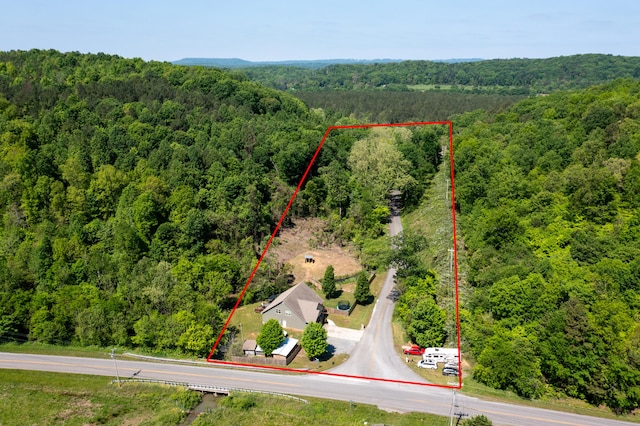 aerial view featuring a view of trees