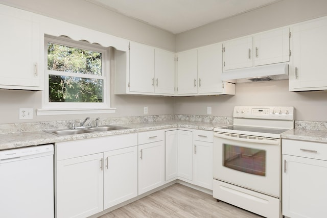 kitchen featuring white cabinetry, white appliances, sink, and light hardwood / wood-style flooring