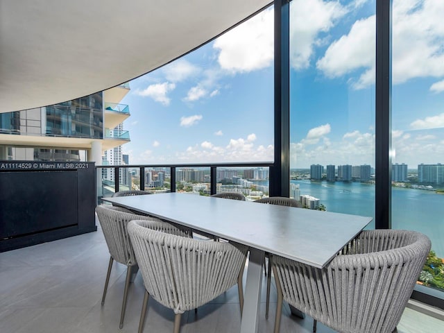 balcony featuring a water view