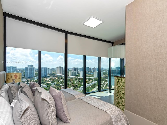 bedroom featuring floor to ceiling windows