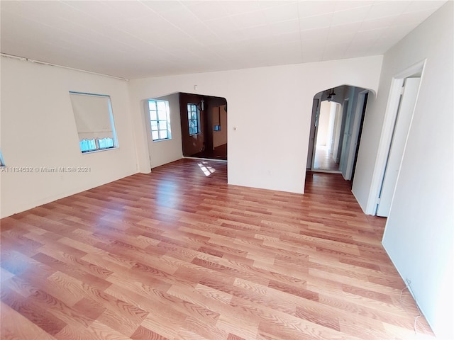 spare room featuring light wood-type flooring