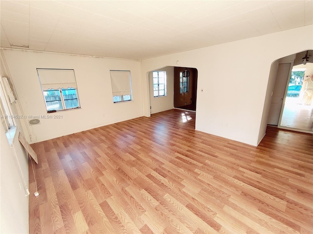 spare room featuring light hardwood / wood-style flooring