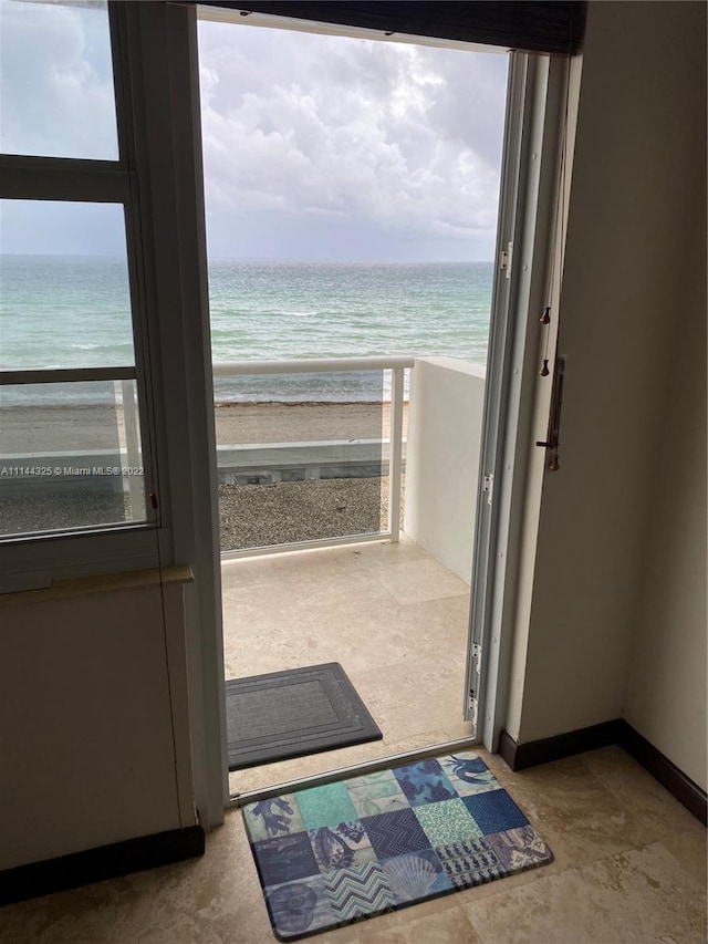 entryway featuring a water view