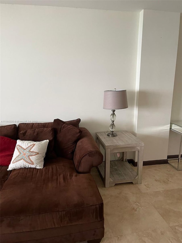 living room with light tile flooring