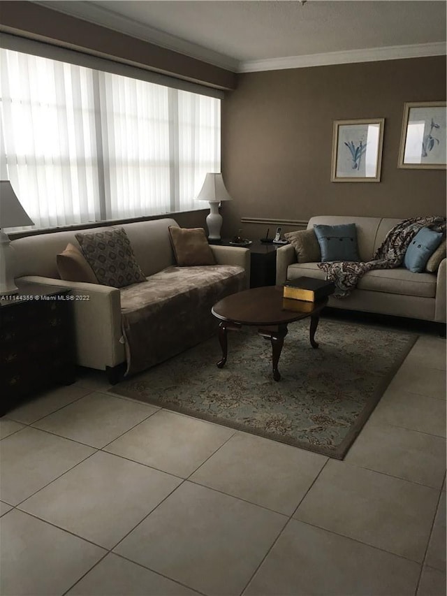 tiled living room featuring crown molding