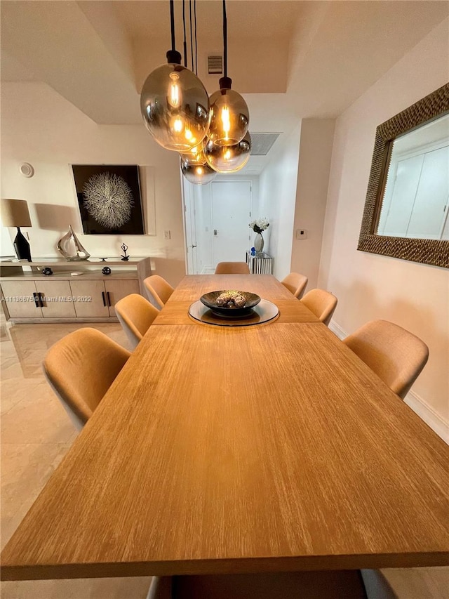 unfurnished dining area with light tile floors