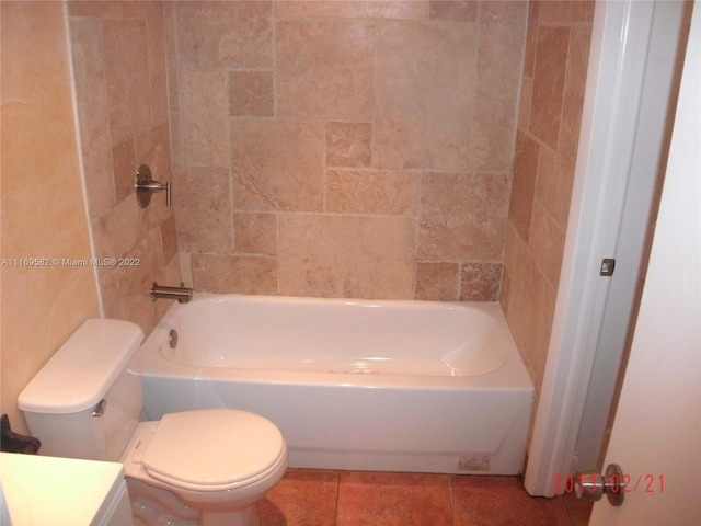 bathroom with tile patterned floors, vanity, and toilet