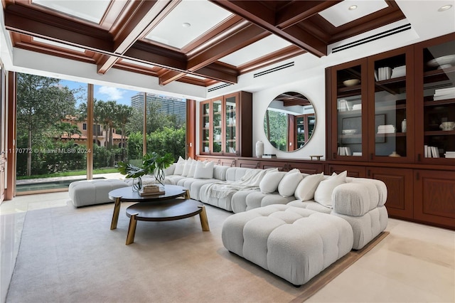 sunroom / solarium featuring beam ceiling and coffered ceiling