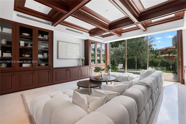 living room featuring crown molding, coffered ceiling, and beamed ceiling