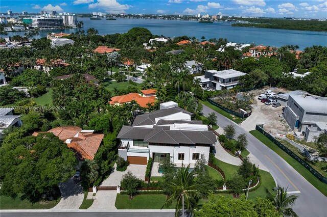 birds eye view of property featuring a water view