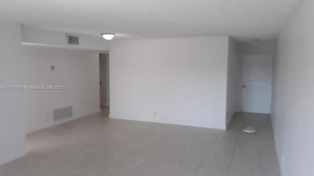 unfurnished room with light hardwood / wood-style floors