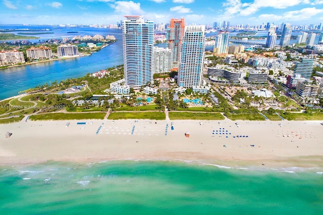 aerial view with a beach view and a water view