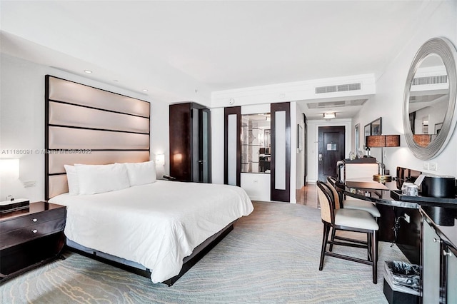 bedroom with wood-type flooring