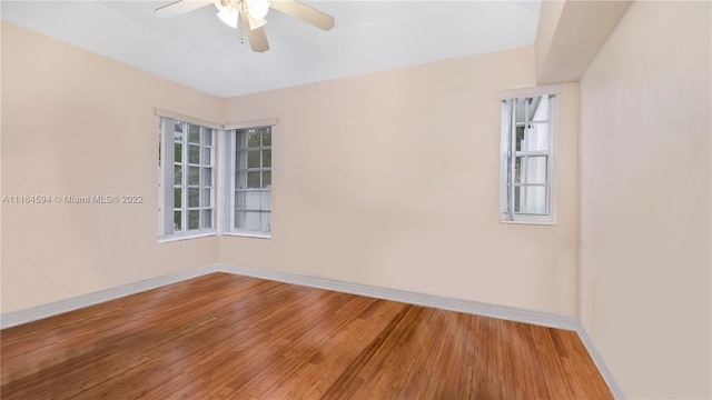 spare room with ceiling fan and light hardwood / wood-style flooring