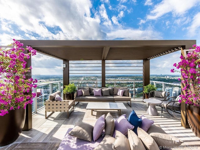 view of terrace featuring a balcony and an outdoor living space