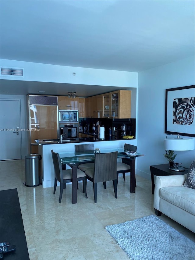 view of tiled dining area