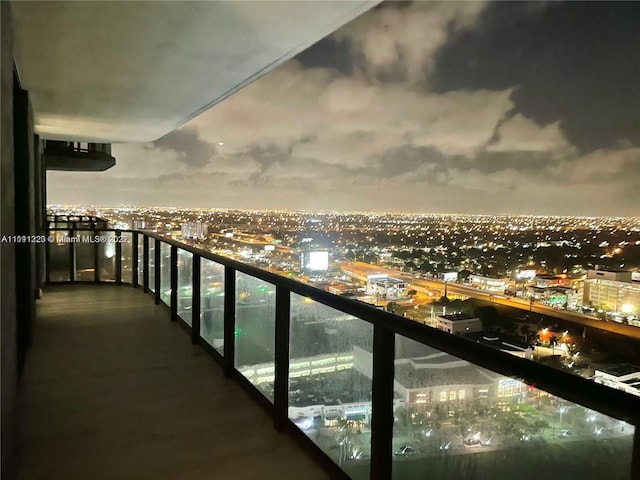 view of balcony at twilight