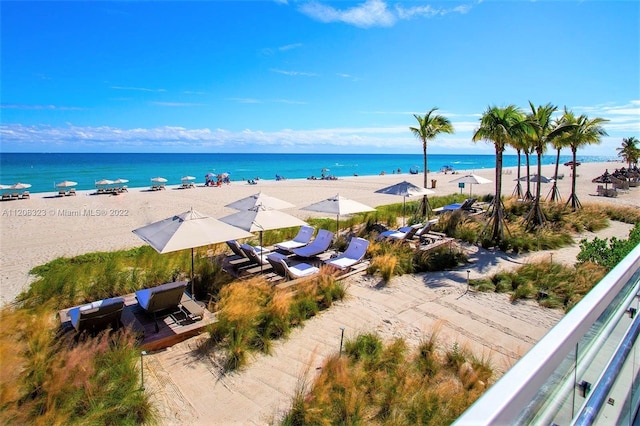 view of water feature with a beach view