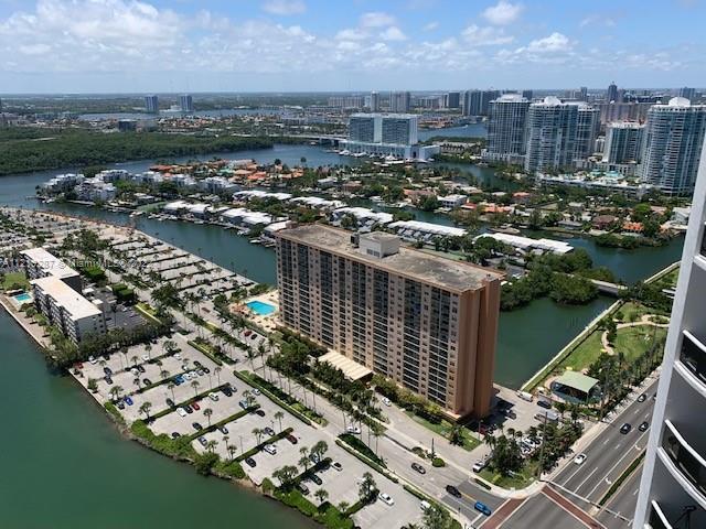 drone / aerial view featuring a water view