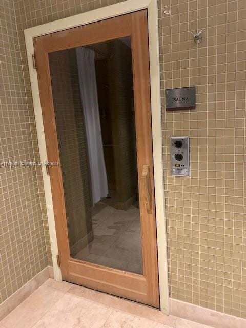 bathroom featuring tile floors