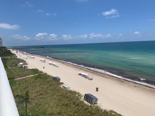 view of water feature with a beach view