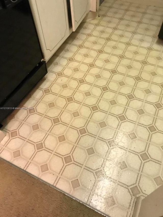 interior details featuring light tile flooring