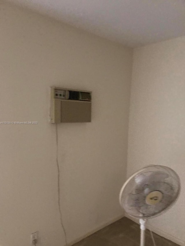 interior space with a wall mounted AC