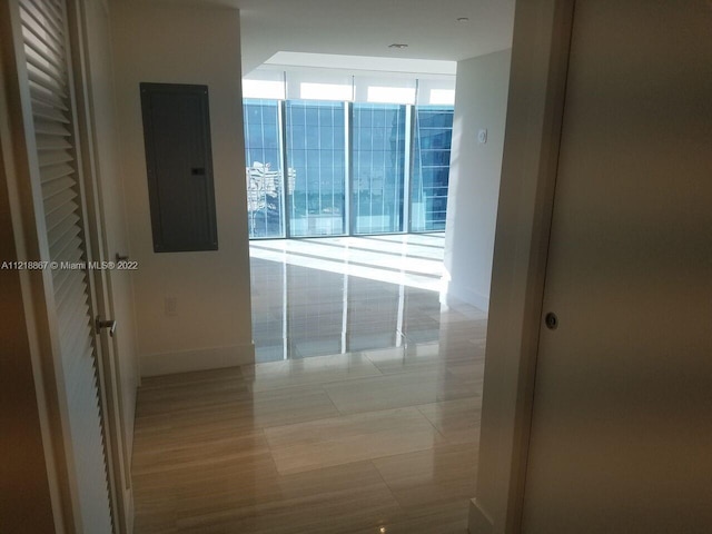 corridor with light tile floors