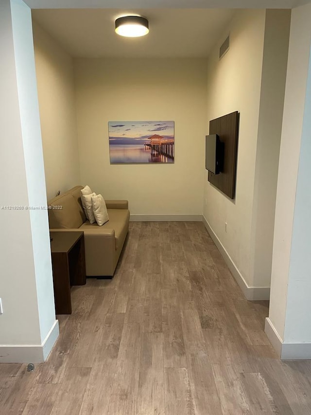 living area featuring hardwood / wood-style flooring