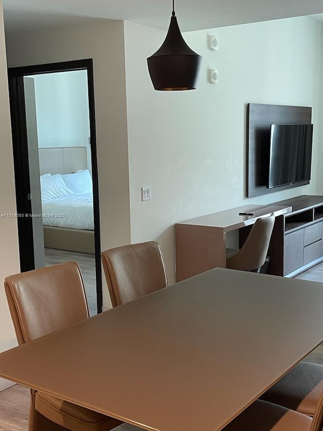 dining room with light hardwood / wood-style flooring