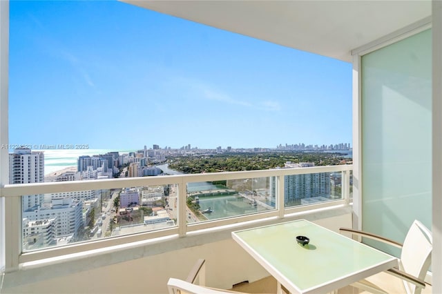 balcony featuring a water view