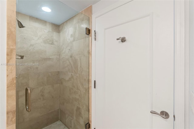 bathroom with an enclosed shower