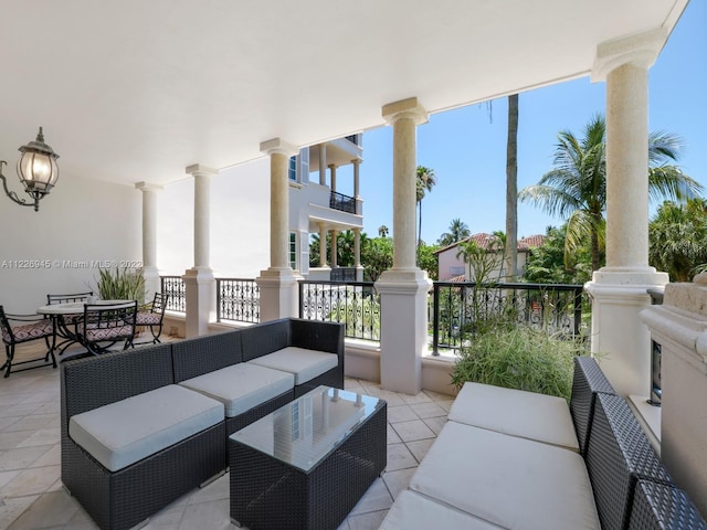 view of patio / terrace featuring a balcony and an outdoor living space