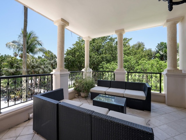 view of patio / terrace featuring a balcony and an outdoor living space