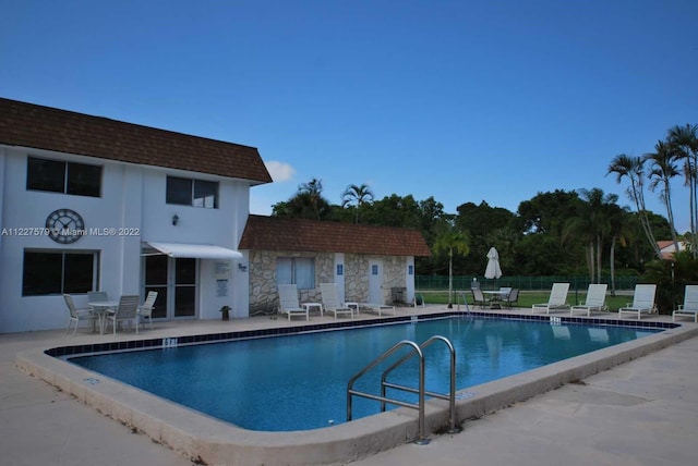 view of pool with a patio area