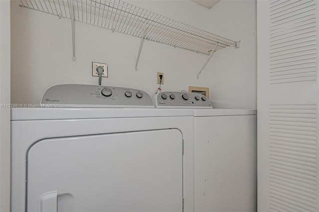 laundry room with hookup for a washing machine, independent washer and dryer, and hookup for an electric dryer