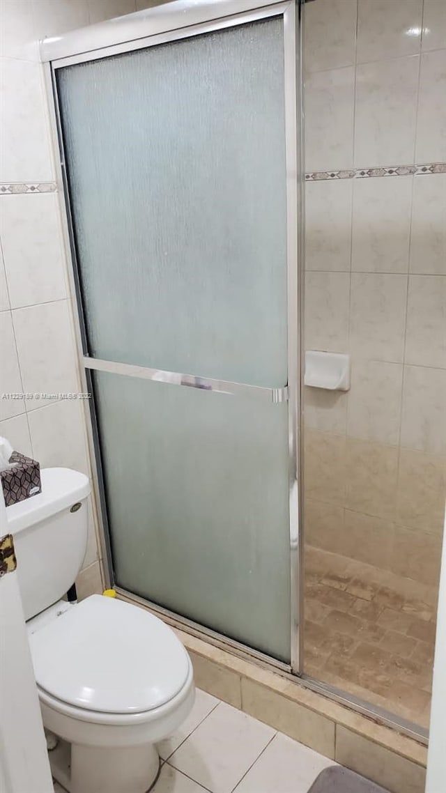 3401 N Country Club Dr Unit 406, Aventura, FL 33180 - full bathroom with a stall shower and tile patterned floors