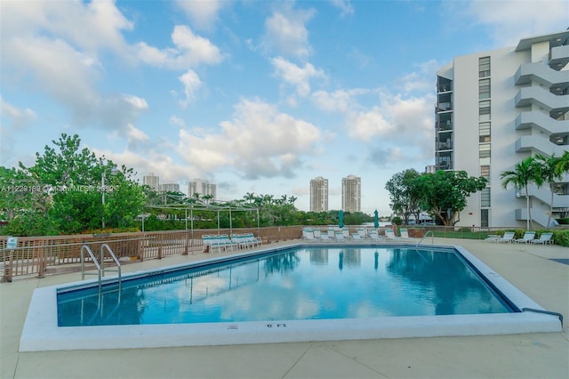 3401 N Country Club Dr Unit 406, Aventura, FL 33180 - community pool with a view of city and a patio area
