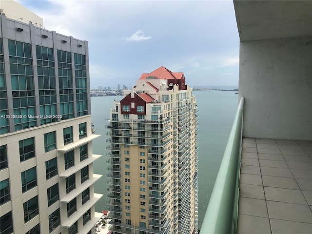 balcony featuring a water view