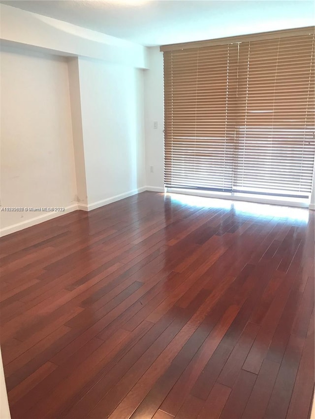 empty room featuring hardwood / wood-style floors