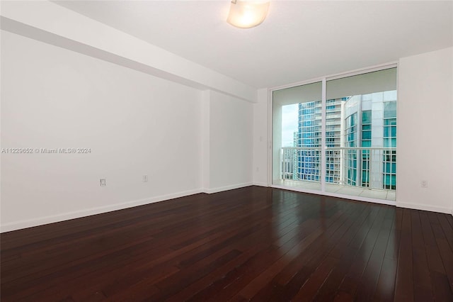 empty room featuring hardwood / wood-style flooring