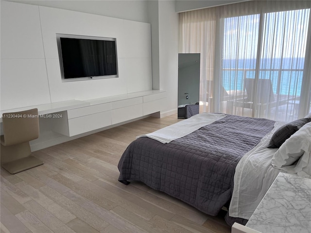 bedroom featuring light hardwood / wood-style floors